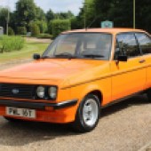 Continuing the no-reserve theme, this 1979 Ford Escort RS2000 Custom is bound to attract some significant bids. Neatly restored, it looks fantastic in Signal Orange and still boasts its original brown cloth interior trim.