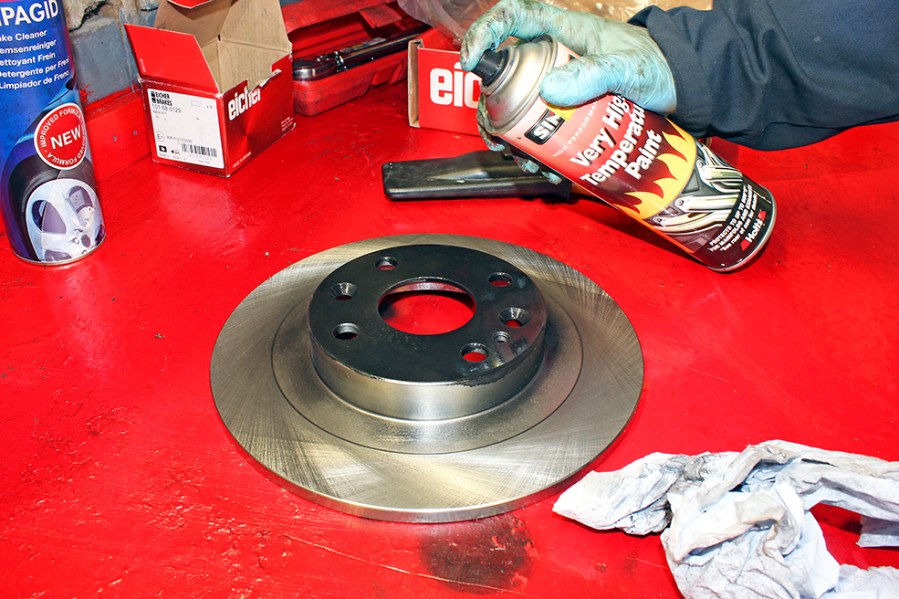 Spray painting the centre section of a new brake disc (the area where the brake pads do not come into contact) can help to protect it from corrosion. A high-temperature paint should withstand the heat generated from the brakes.