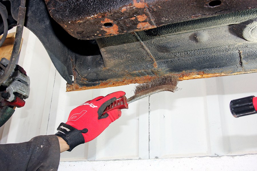 A wire brush and scraper can be used to remove as much flaky rust from an area that needs to be treated. Using a wire wheel attached to an electric drill or angle grinder is often quicker, but wear a full-face mask to protect yourself from flying debris.