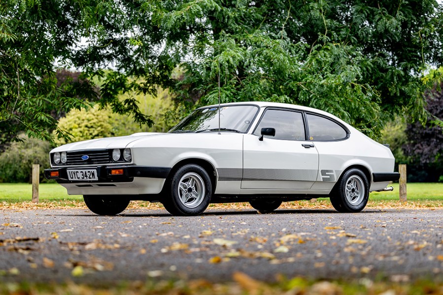 With just 63,000 miles to its name, this 1981 Ford Capri Mk3 3.0S looks to be in lovely condition and sports desirable ‘fishnet’ Recaros, trimmed in Carla with Savannah fabric surrounds. Benefitting from a recent thorough service and extensive gasket renewal, it’s ready to be used and carries a £17,000–23,000 guide