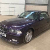 Resplendent in the rare shade of Techno Violet, this 1996 BMW E36 M3 Evolution Convertible boasts a hefty, documented history. It carries an £11,000–13,000 estimate