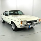 This 1977 3.0-litre Capri Ghia in white is still quite the head-turner. The vendor advises many new mechanical parts, plus a new rear panel, rear wheel arches and quarter panels. It all adds up makes the £10,000–12,000 guide look very reasonable