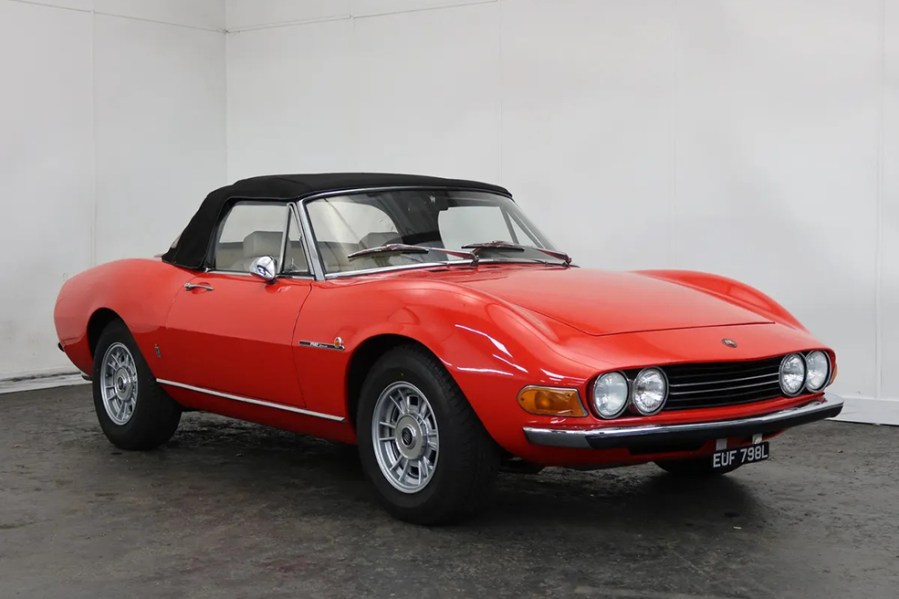 Cutting a dash in Ferrari-esque red, this stunning 1971 Fiat Dino Spider 2400 is one of just 420 made and recently benefitted from an engine rebuild by a Dino specialist to the tune of £17,000. It carries a hefty £100,000–120,000 estimate