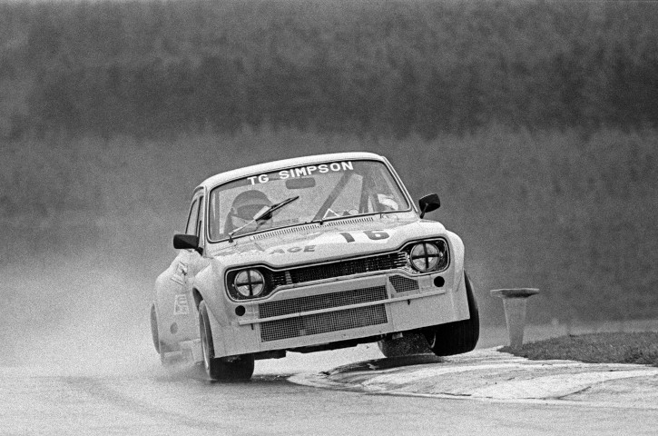 Ford escort on the kerbs racing at Knockhill in the 1970s