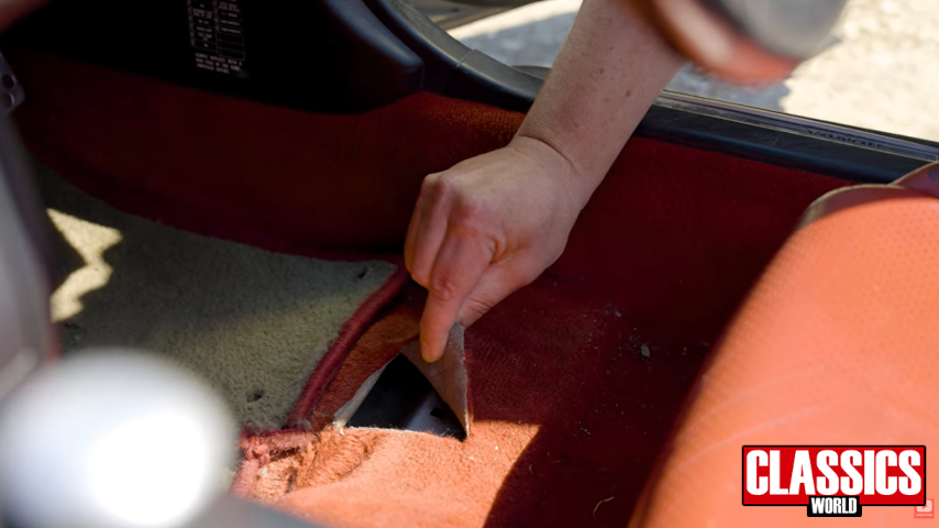 Ripped red carpet from a Honda S2000