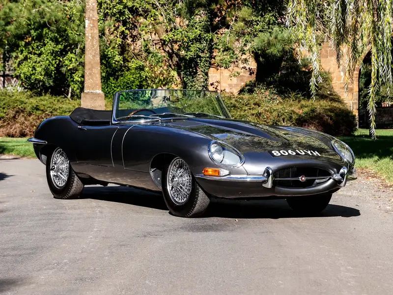 An early ‘flat floor’ variant, this 1961 Jaguar E-Type Series 1 3.8 roadster is a matching numbers example resplendent in Opalescent Gunmetal with a red leather interior. It’s been beautifully restored and is guided at £85,000-£100,000.