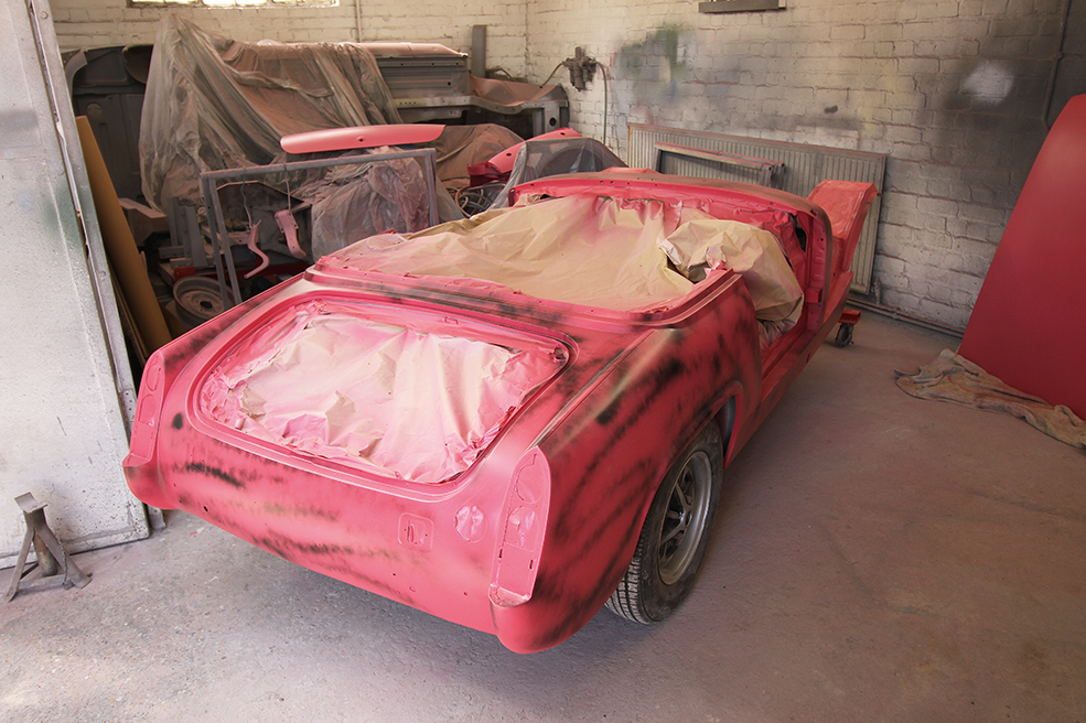 It was something of a shock to see it painted pink, though! The black guide coat will be removed during the final flatting back. 
