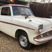 This 1966 Ford Anglia is the more powerful 123E Super DeLuxe variant with the 1200 motor. Resplendent in Ermine White with a Dragon Red roof and stripe, it was comprehensively restored by a professional panel beater over 15-20 years and comes with several spares. It's guided at £8000-£10,000.