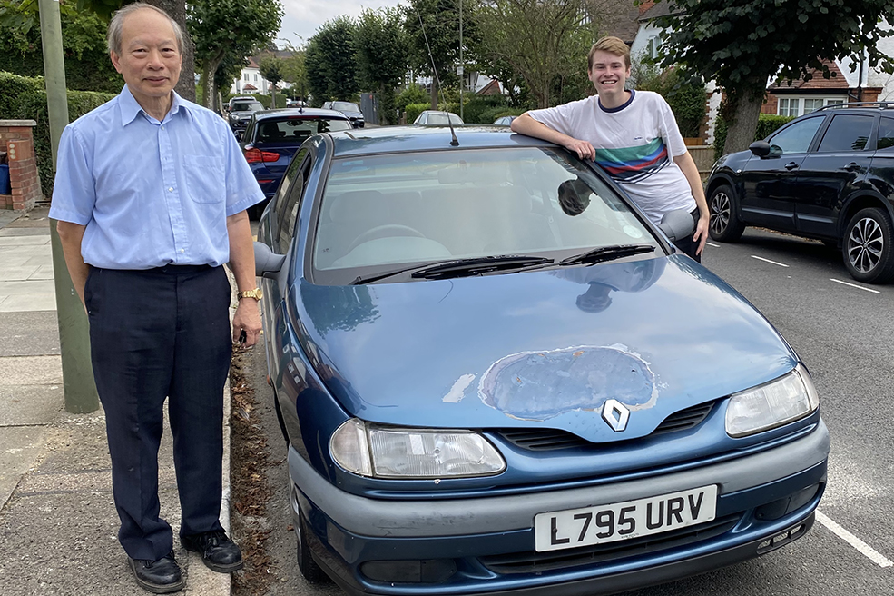 Teenage enthusiast Jude Currie (right) has made it his mission to saved cars from being scrapped, including this early Renault Laguna.