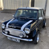 Imported from Japan, this 1999-registered Rover Mini Cooper BSCC was one of 1000 special edition cars built to commemorate 30 years of the Mini's saloon car championship win in 1968 – 750 in green, and 250 in black like this one. Immaculate throughout, it sold for £15,400.