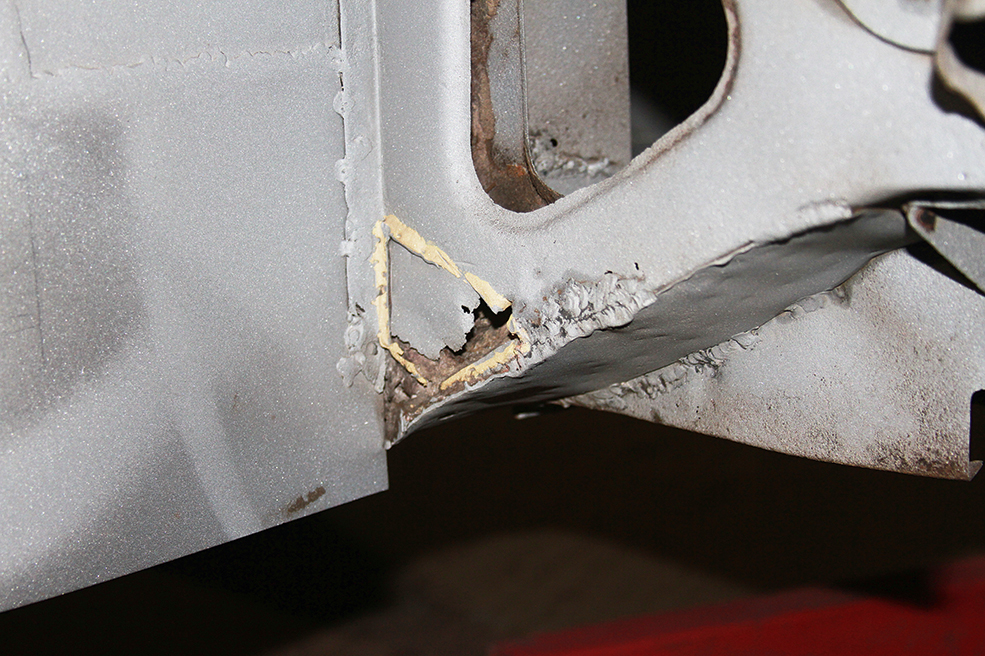you then know exactly how far the rust extends, and you have clean metal to which you can weld. This is in the offside front wheelarch by the toe board