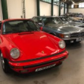 This 1987 Porsche 911 is certainly an interesting example. Being a Super Sport it's got the 930 Turbo-style flared body, spoilers, larger brakes and other tweaks, but a naturally-aspirated motor. This one has covered 166,000 miles, but has had an engine transplant from a later 996 and has been enthusiast-owned for 20 years. Also supplied with its original engine, it's estimated at £65,000-£70,000.